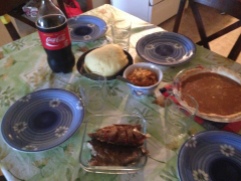 Canadian meets the Congo is this perfect lunch spread of tilapia, ugali, cabbage, tomato sauce, Coke and pumpkin pie.
