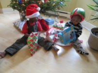 Jesse and Joel didn't know exactly what to do when we gave them their wrapped gifts, but they sure looked great in their hats.