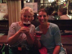 The girls sample a cherry beer.